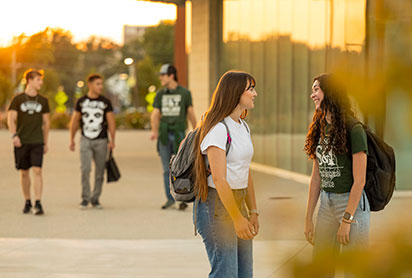 Students talking outside. Links to Beneficiary Designations Students talking outside. Links to Beneficiary Designations