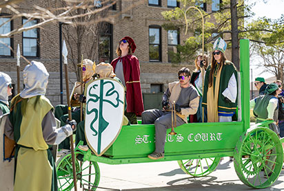 Students at a St. Pattys parade. Links to What to Give Students at a St. Pattys parade. Links to What to Give